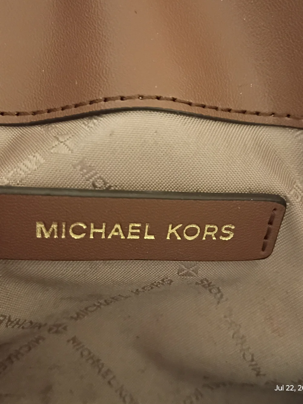 Michael Kors tan leather envelope clutch with gold logo